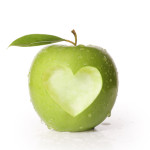 green apple with heart carved out