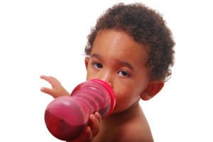 baby drinking from sippy cup