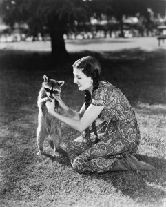 vintage woman with raccoon