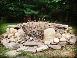 A re-built stone firepit.